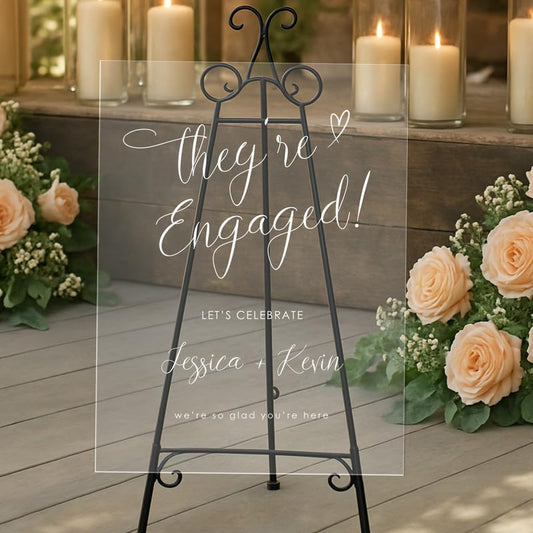 "They're Engaged!" Whimsical Welcome Sign - Modern Cursive Decor for an Engagement Celebration