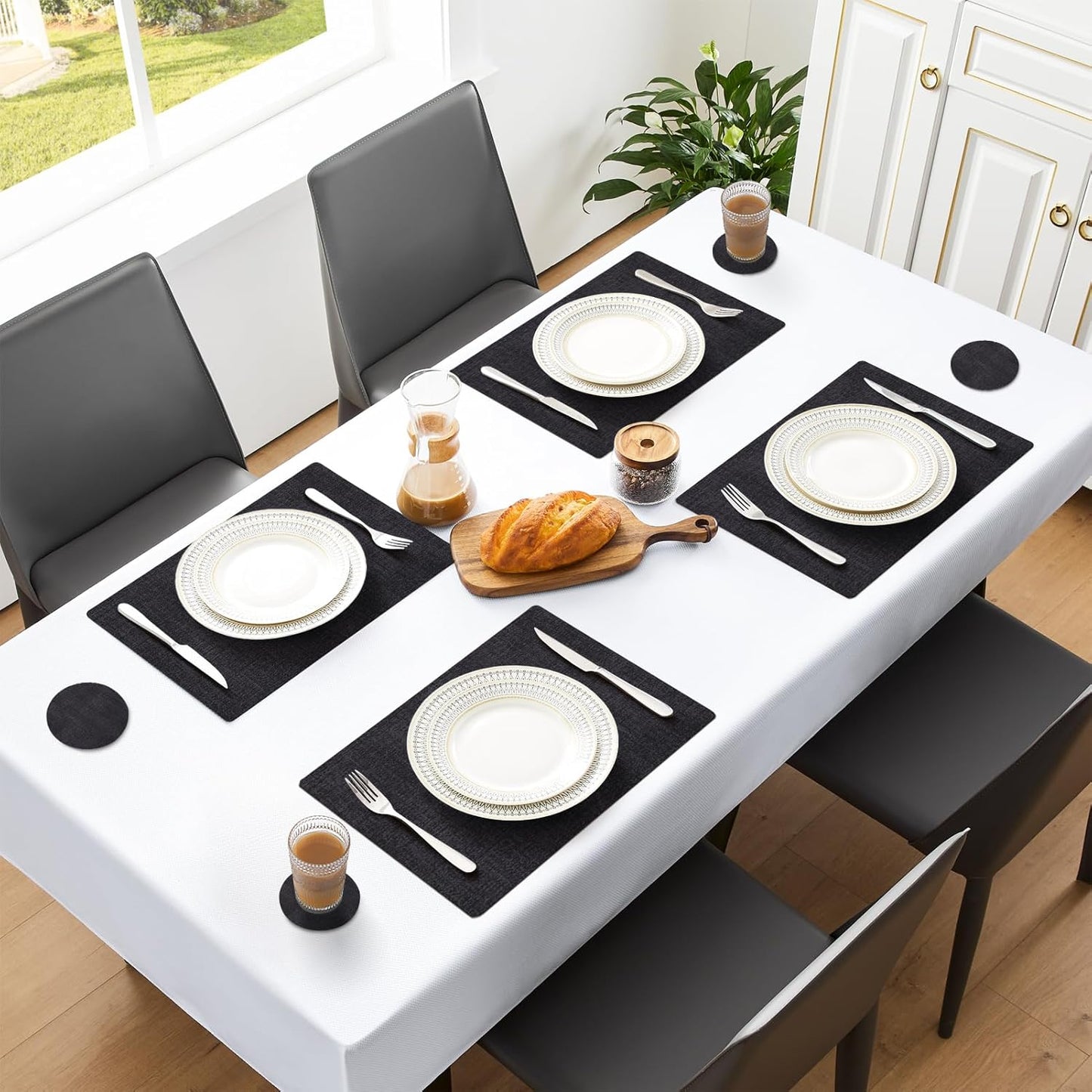 MOSAYT Placemats Set of 8, Heat Resistant Vinyl Place Mats with Coasters, Wipeable Washable 100% Waterproof Oil Proof Faux Leather Table Mats for Kitchen Dining Party Outdoor, 12" x 18", Black