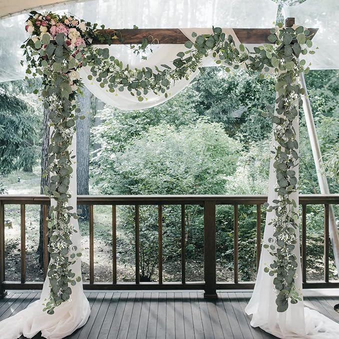 SOMYTING Artificial Eucalyptus Garland with White Flowers 2 Packs 5.9Ft Silver Dollar Leaves Eucalyptus Garland Faux Greenery Vines for Wedding Arch Table Runner Mantle Party Room Decor
