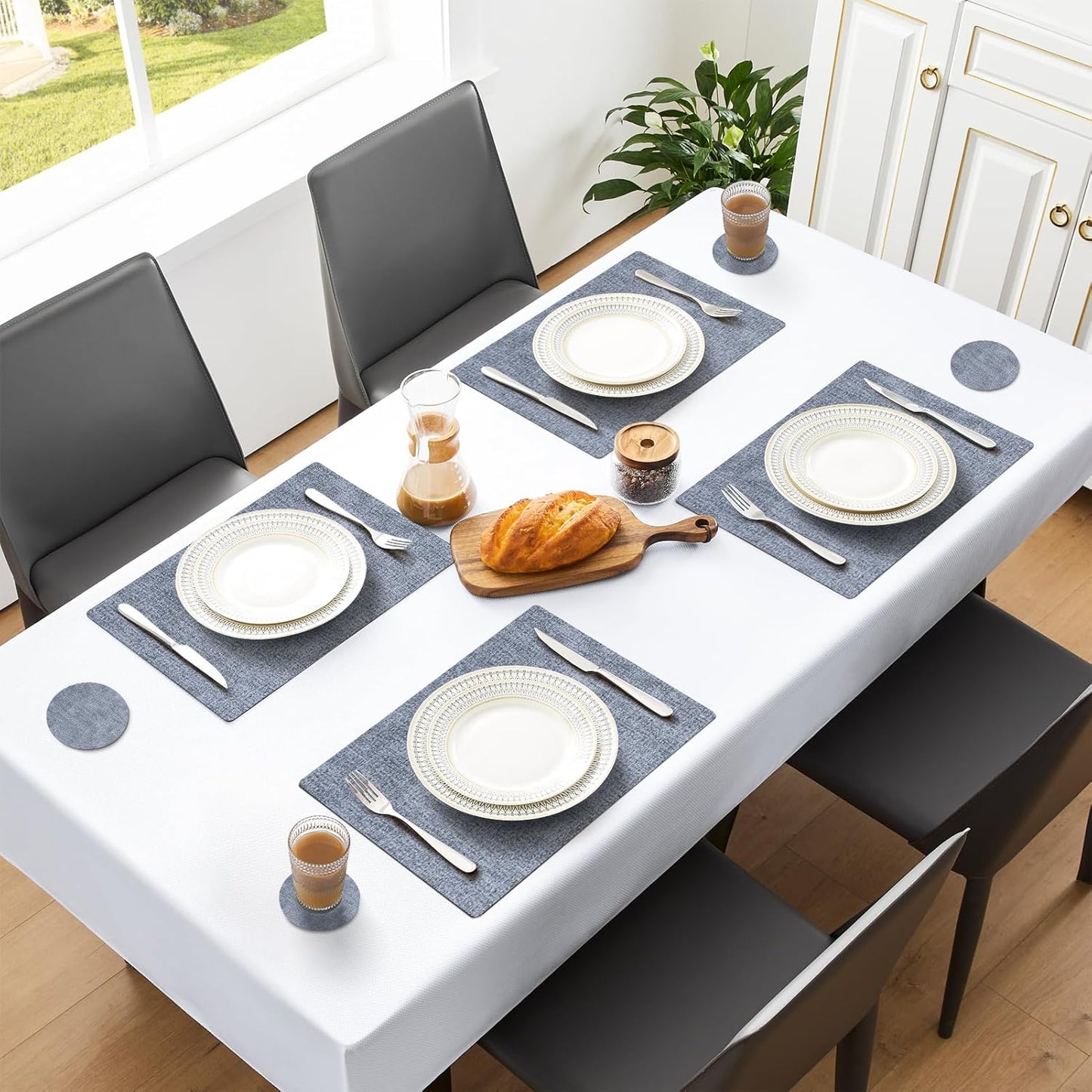 MOSAYT Placemats Set of 8, Heat Resistant Vinyl Place Mats with Coasters, Wipeable Washable 100% Waterproof Oil Proof Faux Leather Table Mats for Kitchen Dining Party Outdoor, 12" x 18", Sky Blue