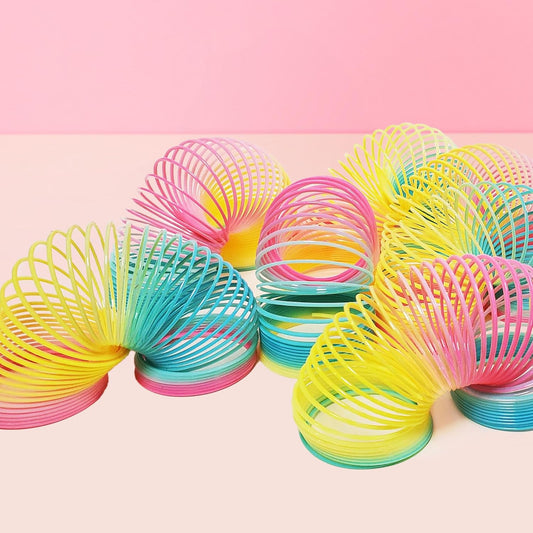 Glow Fever 12 Pack Magic Spring Fidget Toys (2.4 Inch) Neon Sensory Coils for Kids & Adults, Durable Plastic Party Favors, Classroom Prizes, Christmas Stocking Stuffers & Stress Relief Toys