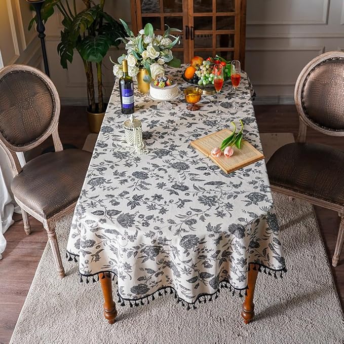SUTAVIA Boho Cotton Linen Tablecloth Bohemian Black Floral Beige Fabric Tassel Lace Farmhouse Table Top Dust-Proof for Home Kitchen Holiday Party Dining Table (Black Flower, Oval, 60"x84")