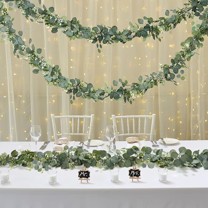 TOCHGREEN 2 PCS Artificial Eucalyptus Garland 5.9FT Faux Silver Dollar Greenery Garland Vines with White Flower Boxwood Fake Hanging Plants for Wedding Home Party Table Mantle Wall Decor