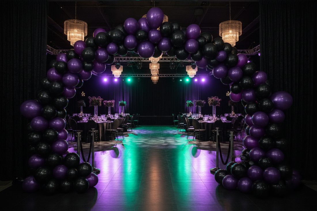 Homecoming dance venue entrance with black and purple balloon garland arch for a formal school dance decoration