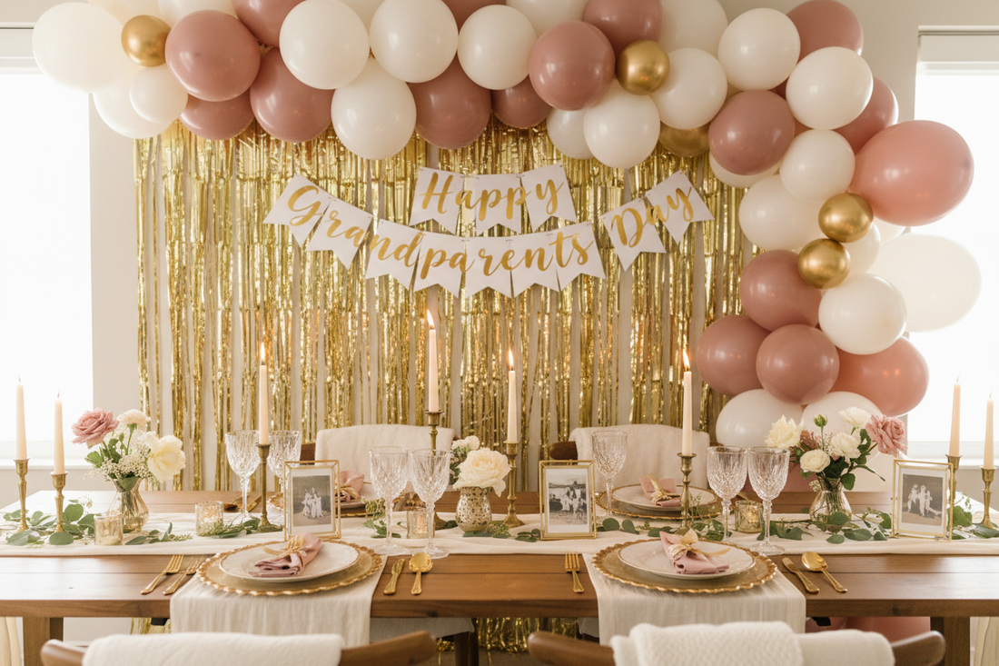Grandparents Day party decorations with balloon garland, personalized banner, and gold fringe curtain backdrop in dusty rose and cream tones