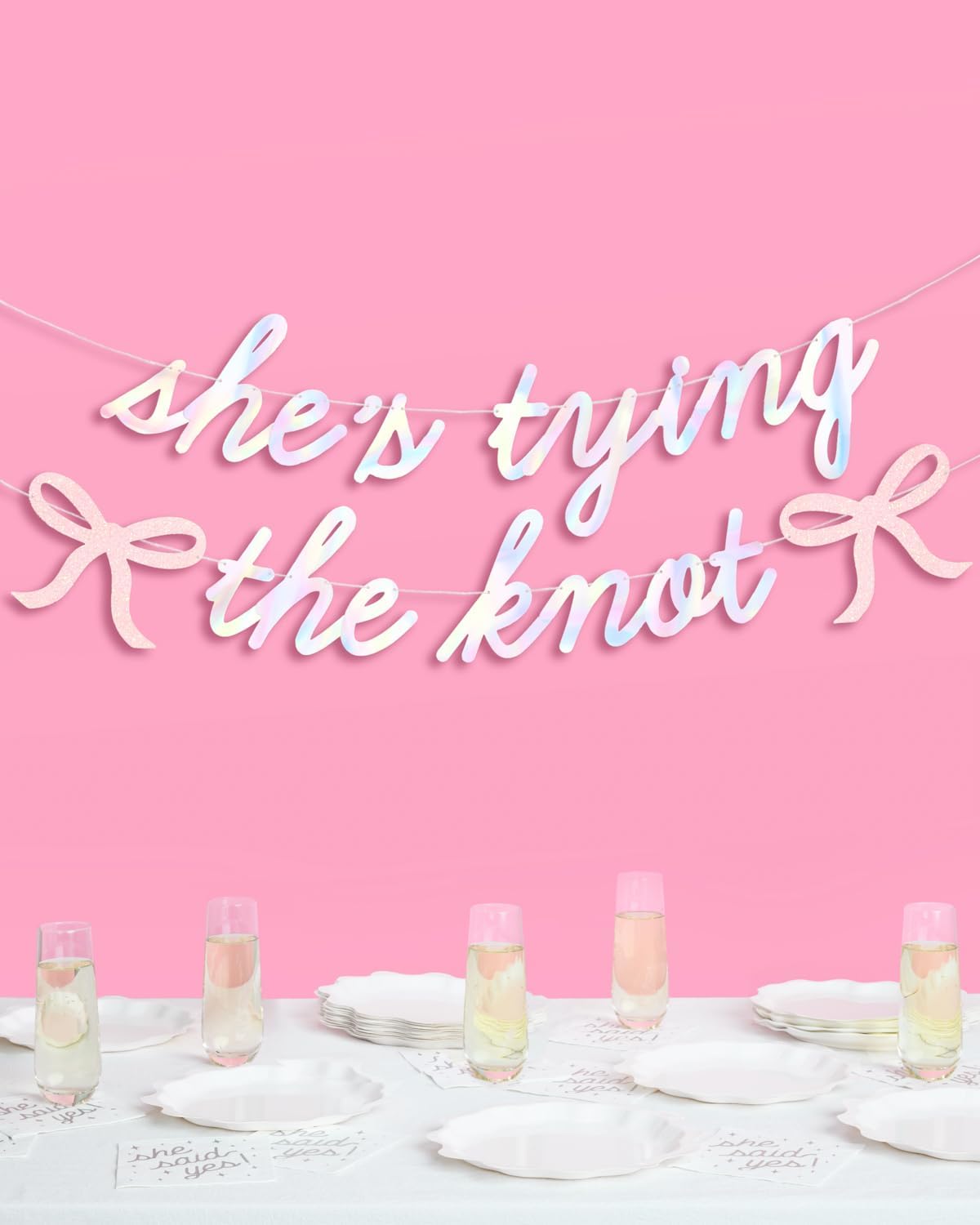 xo, Fetti She's Tying the Knot Banner - Iridescent Foil | 4.5 Ft. | Bow Bachelorette Decorations, Engagement Party Sign, Proposal Background, Bach Supplies