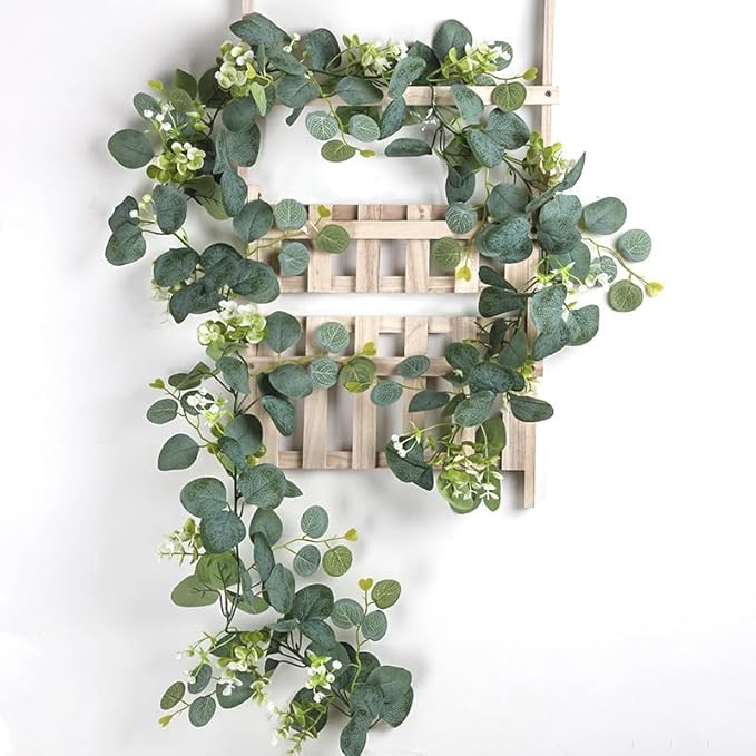 SOMYTING Artificial Eucalyptus Garland with White Flowers 2 Packs 5.9Ft Silver Dollar Leaves Eucalyptus Garland Faux Greenery Vines for Wedding Arch Table Runner Mantle Party Room Decor