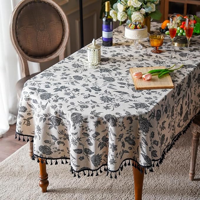 SUTAVIA Boho Cotton Linen Tablecloth Bohemian Black Floral Beige Fabric Tassel Lace Farmhouse Table Top Dust-Proof for Home Kitchen Holiday Party Dining Table (Black Flower, Oval, 60"x84")