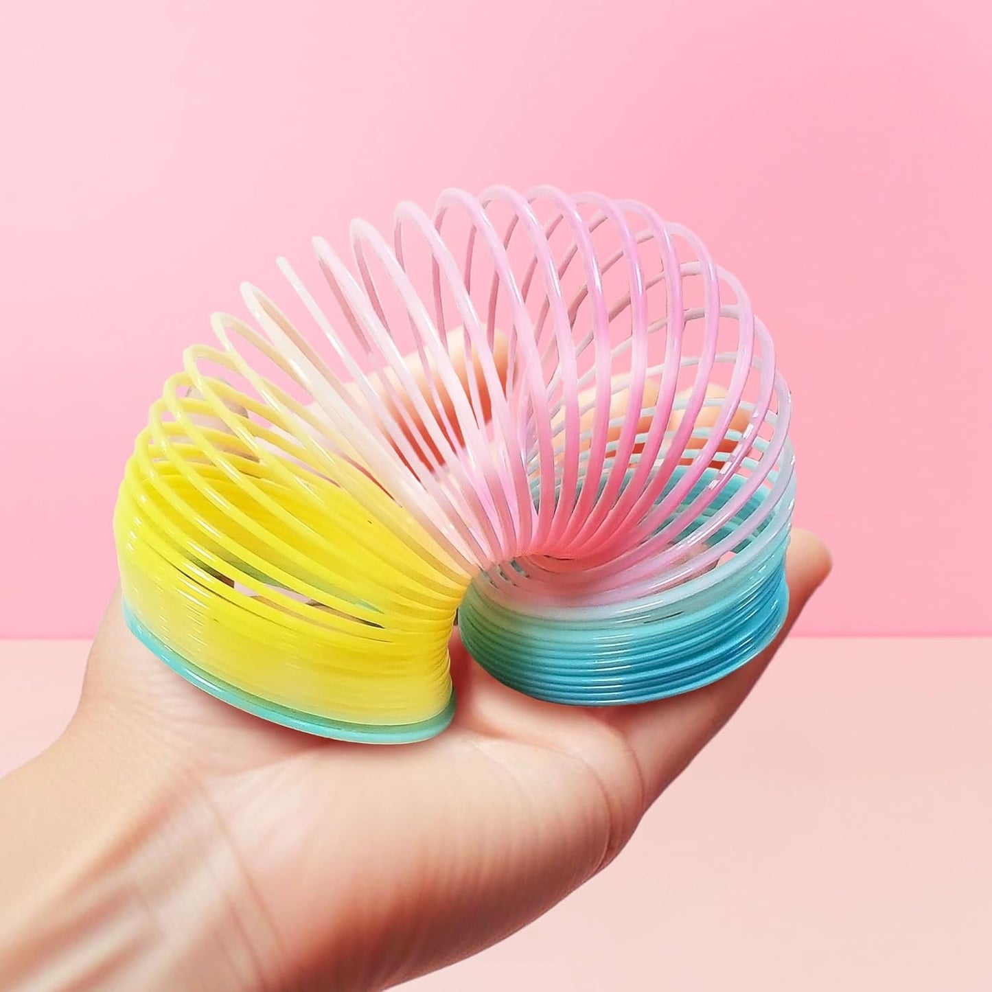 Glow Fever 12 Pack Magic Spring Fidget Toys (2.4 Inch) Neon Sensory Coils for Kids & Adults, Durable Plastic Party Favors, Classroom Prizes, Christmas Stocking Stuffers & Stress Relief Toys