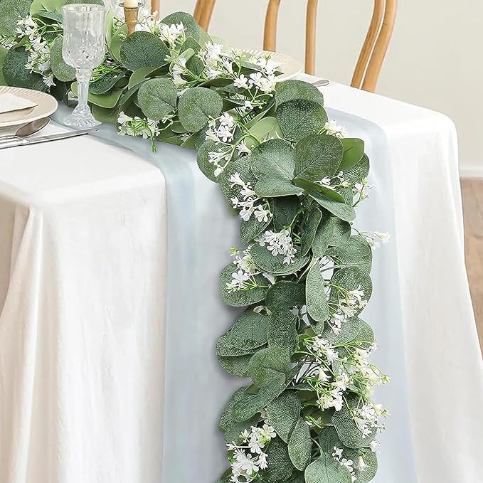 KHOYIME Eucalyptus Garland with White Flowers, 2 Packs 5.9Ft Artificial Silver Dollar Eucalyptus Leaves Plant Fake Greenery Hanging Ivy Vines Faux Wreath for Wedding Arch Party Mantle Table Home Decor