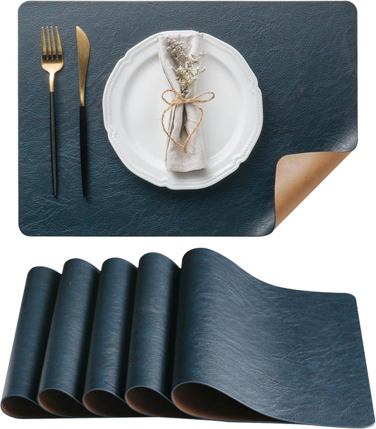 DOLOPL Placemats Set of 6 Reversible Dual-Color Table Placemats – Heat Resistant Wipeable & Washable Place Mats, Luxury Faux Leather Table Mats for Vintage Dining Table Decor (Camel & Navy Blue)