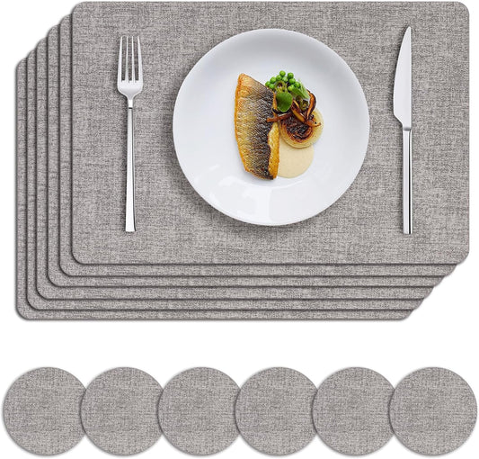 MOSAYT Faux Leather Placemats Set of 6, Heat Resistant Wipeable Washable Vinyl Place Mats with Coasters, Waterproof Oil Proof Table Mats for Kitchen Dining Party Outdoor, 12" x 18", Light Grey