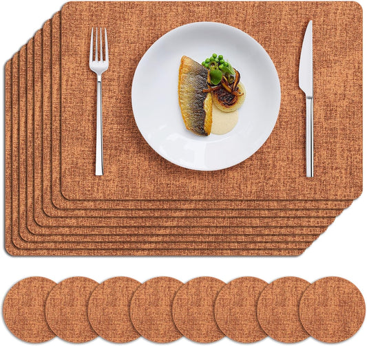 MOSAYT Placemats Set of 8, Heat Resistant Vinyl Place Mats with Coasters, Wipeable Washable 100% Waterproof Oil Proof Faux Leather Table Mats for Kitchen Dining Party Outdoor, 12" x 18", Orange
